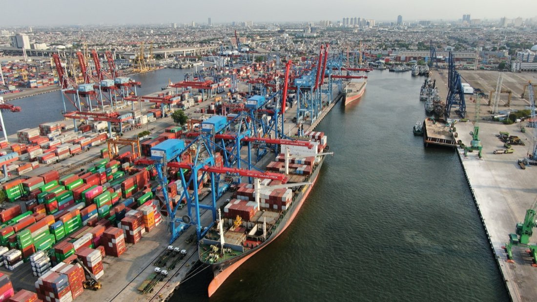 Aerial view of a container port and cargo ship